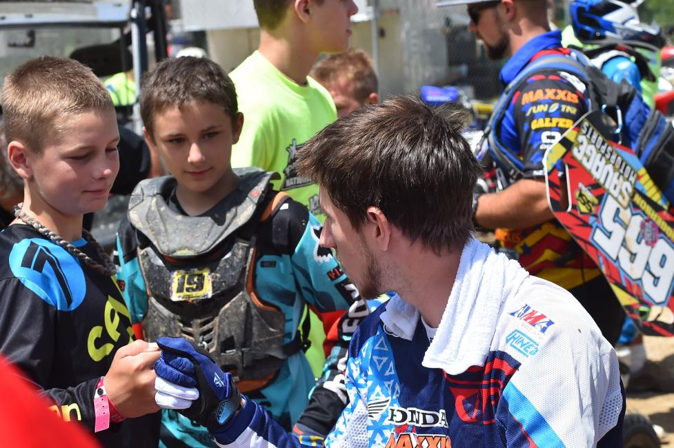 Joel Hetrick chatted with some youth riders before the start of his pro moto.