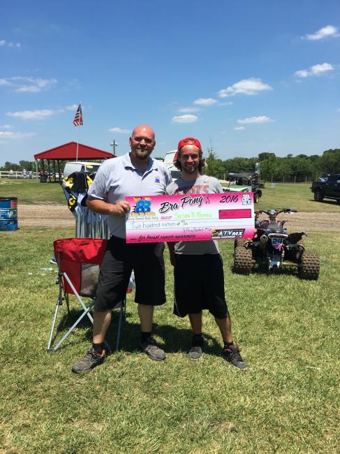 88 Live to Ride medical staff, John Orr and AMA Pro ATV Racer, Jeffrey Rastrelli pose with their winnings from the Bra Pong at Sunset Ridge.
