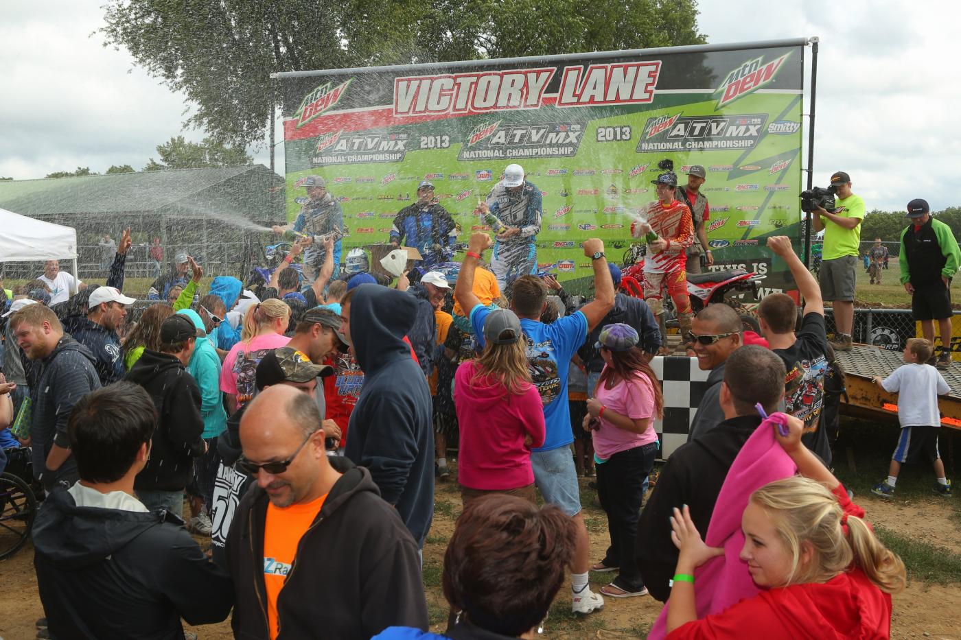 RedBud MX fans cheering for the podium finishers.