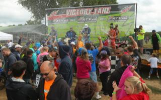RedBud MX fans cheering for the podium finishers.
